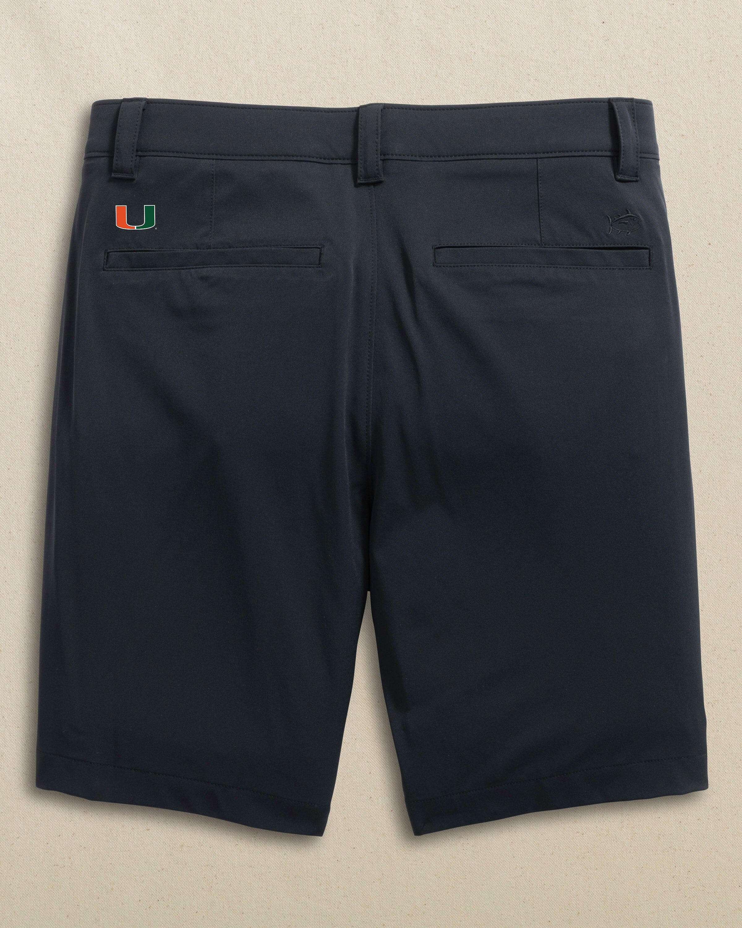 The back view of the Southern Tide Miami Hurricanes brrr°®-die 8" Performance Short by Southern Tide - Caviar Black